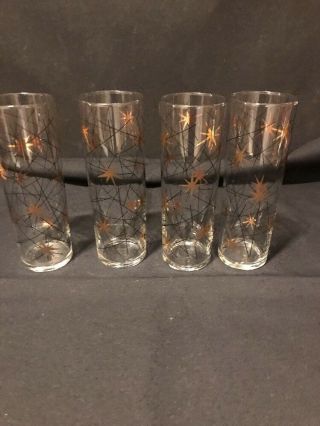 4 Mid Century Atomic Gold And Black 7 Inch Glasses