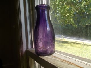 Snow & Palmer Purple Pint Bloomington,  Il Paneled Milk Bottle Over 100 Years Old