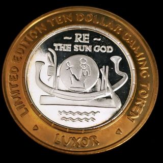 2000 G Luxor Hotel Casino.  999 Silver Strike $10 Re The Sun God Token 0lhc0010