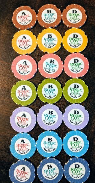 (21) Unique River City St.  Louis Non - Value Cancelled Roulette Chips