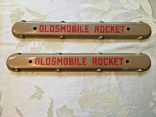 49 - 50 Oldsmobile Rocket Spark Wire Covers 303 Engine Valve Cover Emblem