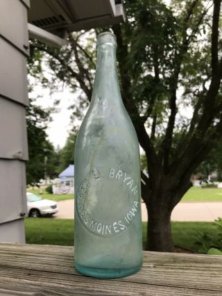 Des Moines,  Iowa 1900’s Rare Quart Soda Bottle Geo E.  Bryan Bottling Crown