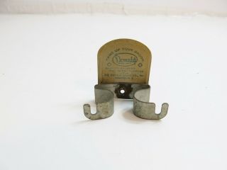 Antique Donald Hand Up Your Broom Advertising Metal Broom Holder