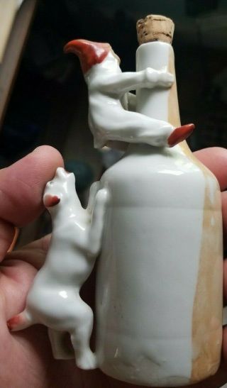 VERY NEAT PORCELAIN EXTRACT VIOLENT PERFUME DOG CHASING BOY FIGURAL ORIG LABEL 5