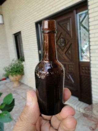 Miniature P.  F.  Herring Ribbon Shoulder Embossed Liquor Amber Bottle Early 1900’s