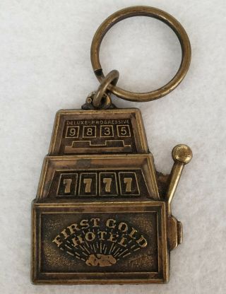 First Gold Hotel Keychain (deadwood,  South Dakota) Casino Slot Machine Key Chain