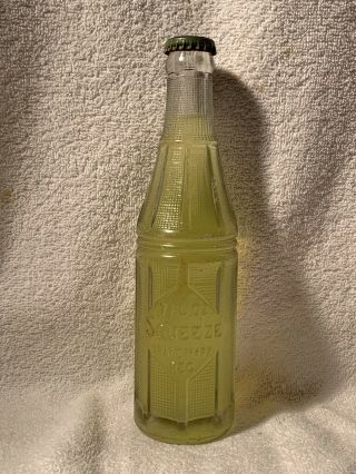 Full 7oz Squeeze Lemon Lime Embossed Soda Bottle