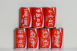 1984 Coca Cola 7 Cans Set From Belgium,  Languages
