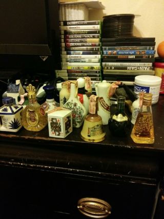 miniature very old liquor bottles various brands some with contents 2