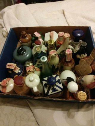 miniature very old liquor bottles various brands some with contents 5