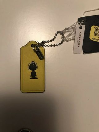 Coach X Peanuts Snoopy Sally Brown Yellow Leather Hangtag Keychain Fob Charm