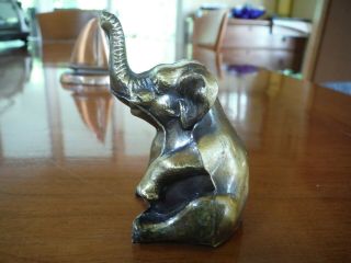Crane & Breed Casket Co.  Metal Gold Tone Elephant Paperweight - Old &