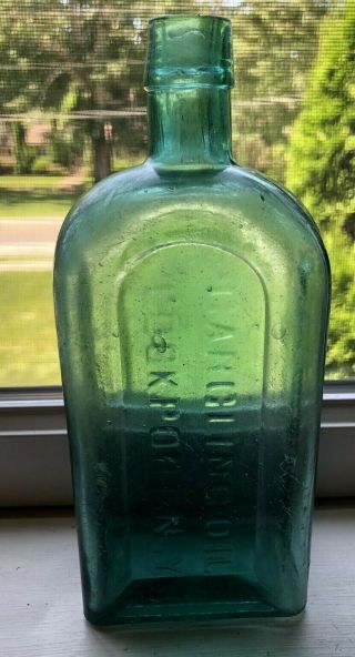 Antique Gargling Oil Bottle Lockport.  N.  Y 2 Part Mold Deep Aqua Color 7 1/4 "