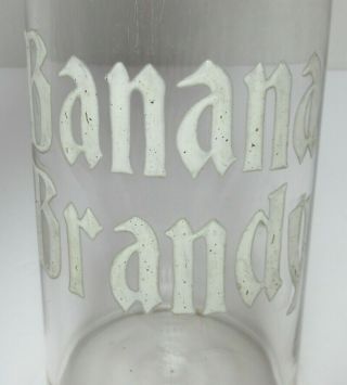 Antique Banana Brandy Back Bar Glass Bottle White Enamel