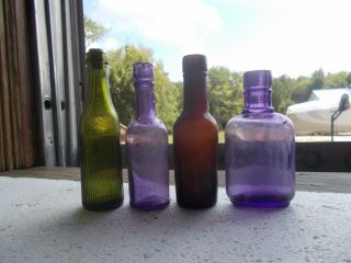 Group Of 4 Different Miniature Sample Size Whiskey Bottles 2 Amethyst Hand Blown