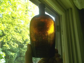 Rich Amber Heavily Whittled Pint Whiskey Flask Emb Cross On Base 1860s