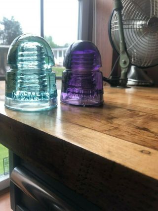 2 Cd 145 G.  N.  W.  Co.  1 Royal Purple 1 Light Aqua Both With Swirls