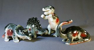Complete Set Of Vintage Ceramic Dinosaurs With Red Sides