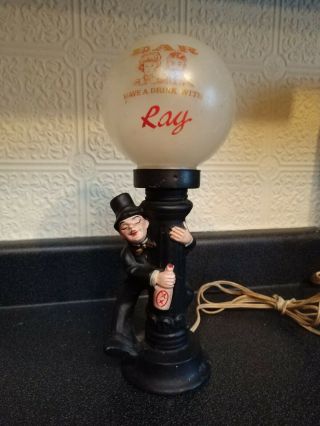 Vintage Ceramic Bar Lamp With Sleepy Drunk Man Hanging On Light Pole