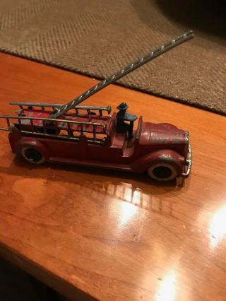 VINTAGE 1940 ' S TOOTSIETOY FIRE TRUCK WITH DRIVER AND 3 LADDERs 8