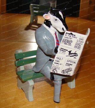 Cowparade,  Citizen Cow (41565) Harrisburg,  2004 (newspaper,  Businessman,  Bench)