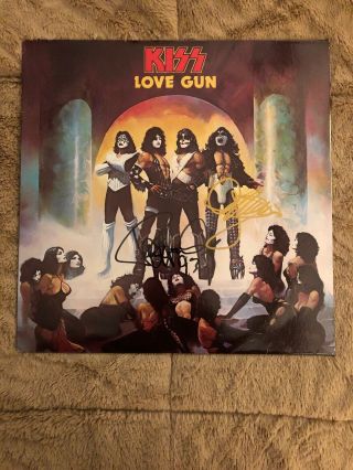 Kiss - Love Gun Nblp - 7057 - 7.  98 - - Order Form & Gun.  Signed By Gene & Paul