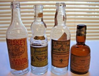 Four Vintage Labeled Miniature Liquor Bottles