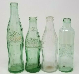 Set Of 4 Contemporary And Vintage Coke Bottles Coca Cola Green Clear Glass