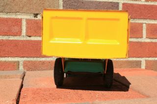 Structo Hydraulic Dump Truck,  1950s,  Green and Yellow pressed metal 6
