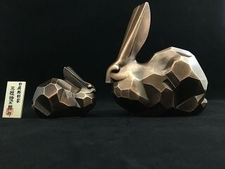 Japanese Bronze Ornament Of Parent And Child Rabbits,  By Soutarou Saegusa