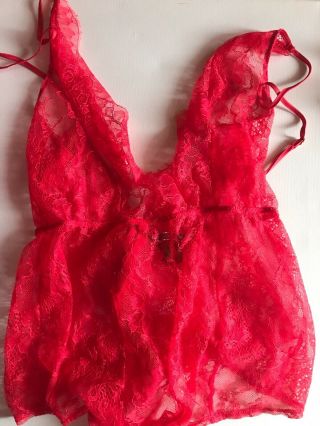 red victorias secret teddy worn by Playboy model Andrea Prince for photoshoot 3
