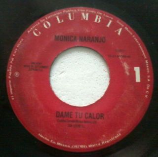 Single: Monica Naranjo " Dame Tu Calor  Supernatural " Columbia (1994)