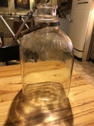Vintage Borden’s Milk Bottle,  1 Gallon,  Clear Glass,  Metal Neck Band & Handle 2