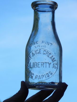 Liberty Dairy & Ice Cream Co.  Big Rapids Mich Michigan Embossed Pint Milk Bottle
