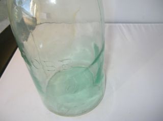 Whittled,  1/2 Gal.  Lite Green Globe Vintage Fruit Jar
