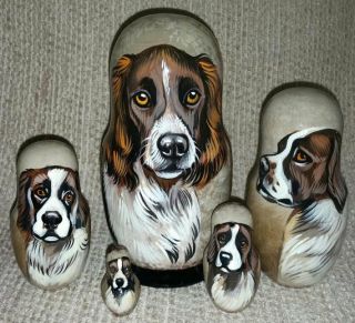 Deutscher Wachtelhund (german Spaniel) On Five Russian Nesting Dolls.  Dogs.