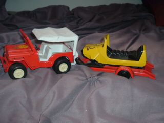 Vintage Tonka Red Metal Graphic Jeep & Trailer With Yellow Plastic Snowmobile.