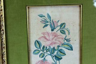 ONE OF A PAIR A SIGNED EARLY 19TH C FOLK ART WATERCOLOR THEOREM OF FLOWERS 2 4