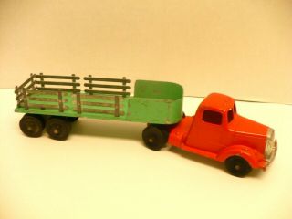 Tootsie Toy L Model Mack With A Stake Side Trailer