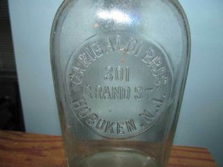 Whiskey Flask Garibaldi Bros Hoboken,  N.  J.  (clear glass 1/2 pint) 2