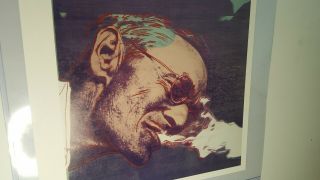 Andy Warhol signed 1986 back has art of man smoking,  very rare.  Great Sig 6