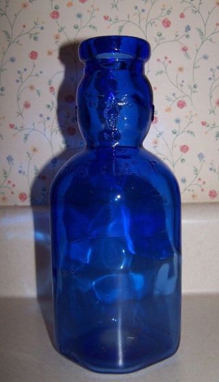 Brookfield baby top cobalt blue glass milk dairy bottle.  Collectible 9 inch. 2