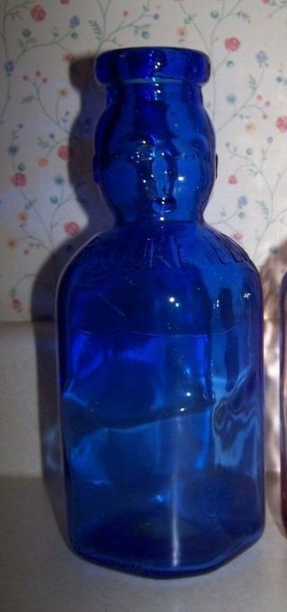 Brookfield baby top cobalt blue glass milk dairy bottle.  Collectible 9 inch. 3