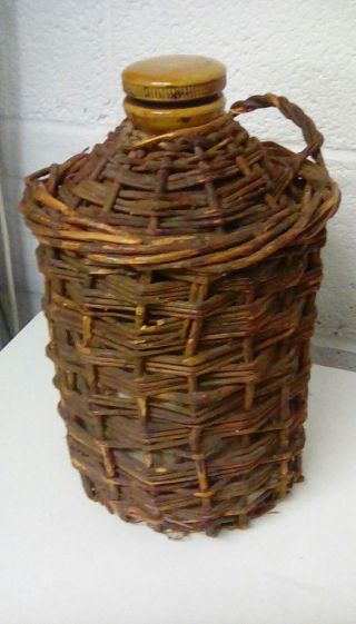 Vintage Stoneware Flagon In Enclosed Wicker Basket.  Rum/wine Demijohn,  Navy??