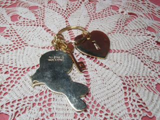 VINTAGE YELLOW TWEET BIRD KEY CHAIN WITH RED HEART AND KEY 1999 WARNER BROS 2