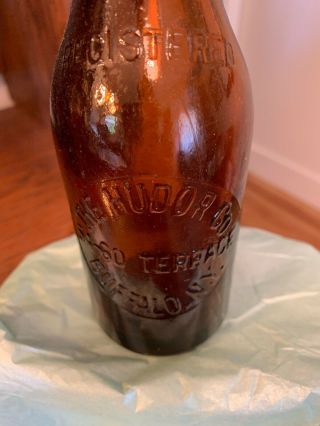 The Hudor Co.  Buffalo N.  Y.  54 - 60 Terrace 7.  5 inch Amber Bottle 2