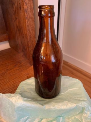 The Hudor Co.  Buffalo N.  Y.  54 - 60 Terrace 7.  5 inch Amber Bottle 5