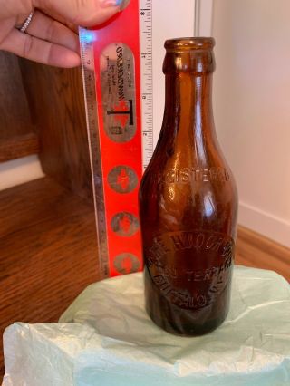 The Hudor Co.  Buffalo N.  Y.  54 - 60 Terrace 7.  5 inch Amber Bottle 7