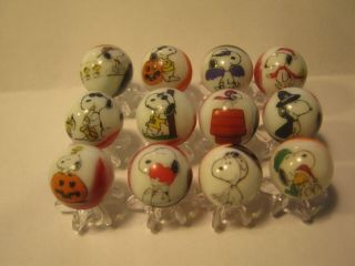 Snoopy From The Peanuts Gang 5/8 Size Glass Marbles,  Stands