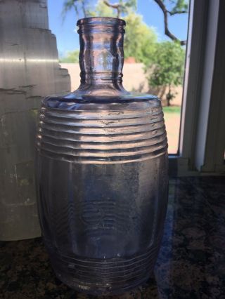 Antique Light Purple Glass Full Barrel Whiskey Bottle,